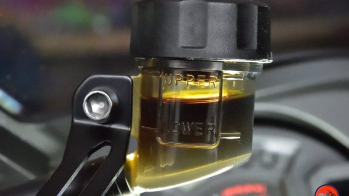 2018 Kawasaki Ninja H2SXSE clutch fluid reservoir with dark fluid in it.