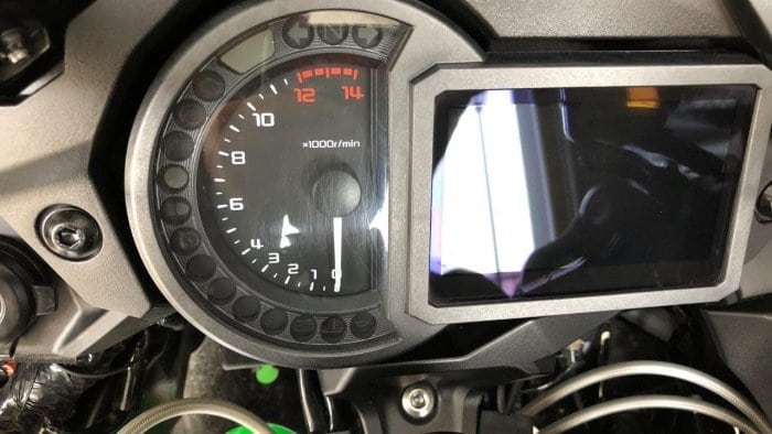 Scratched tachometer cover on a 2018 Kawasaki Ninja H2SXSE.