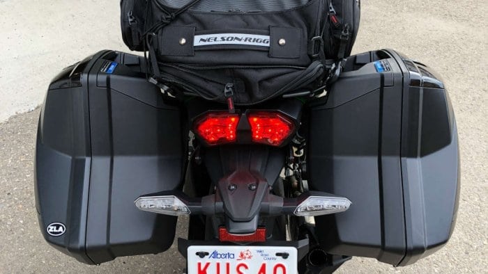 2018 Kawasaki Ninja H2SXSE with luggage installed viewed from the rear.