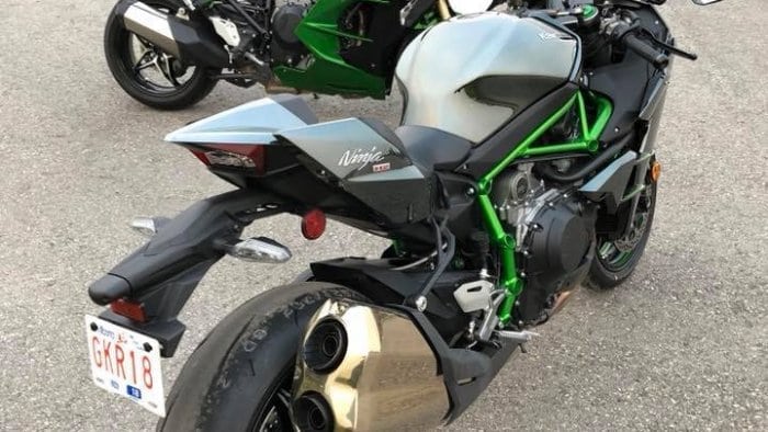 The 2018 Kawasaki H2SX SE beside a 2015 Kawasaki H2.