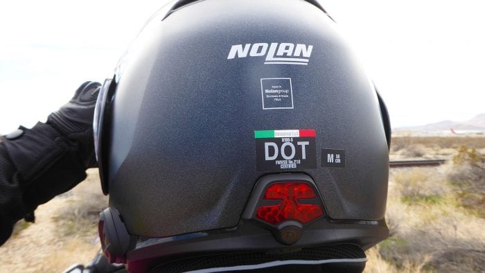 Rear view of the Nolan N100-5 helmet with N-Com B901L and ESS light installed.