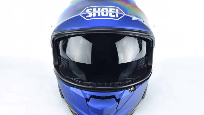 Internal sun lens fully lowered on The Shoei GT Air II.
