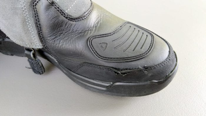 REV'IT! Gravel OutDry Boots closeup of rubber seal tear