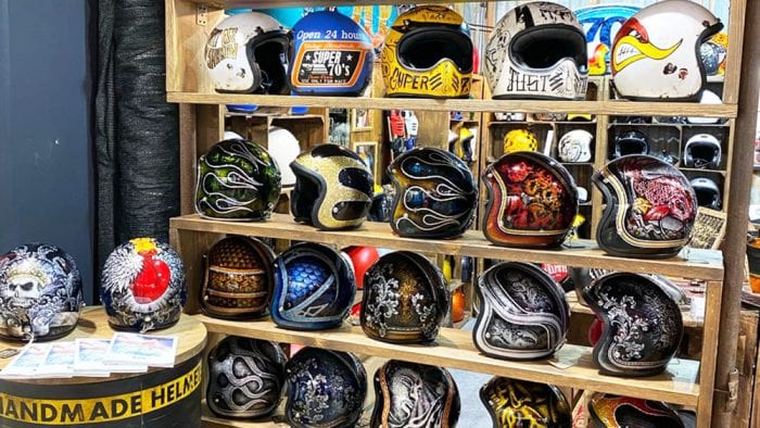 A collection of custom helmets from EICMA 2019 displays.