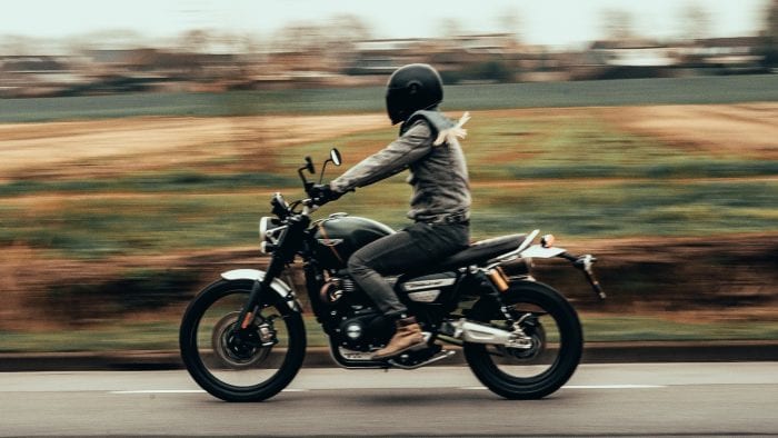 motorcyclist wearing a helmet