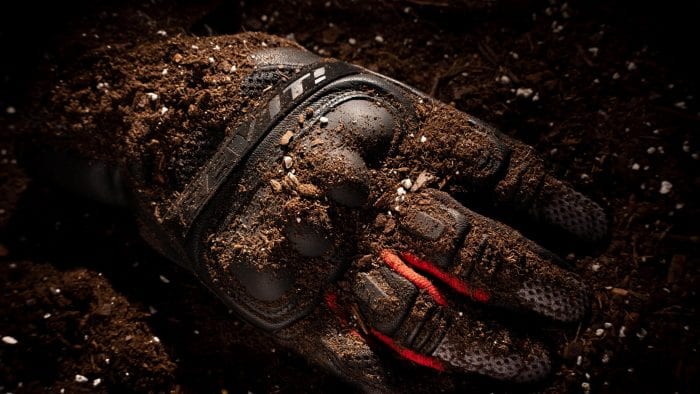 REV'IT Dirt 3 gloves covered in dirt