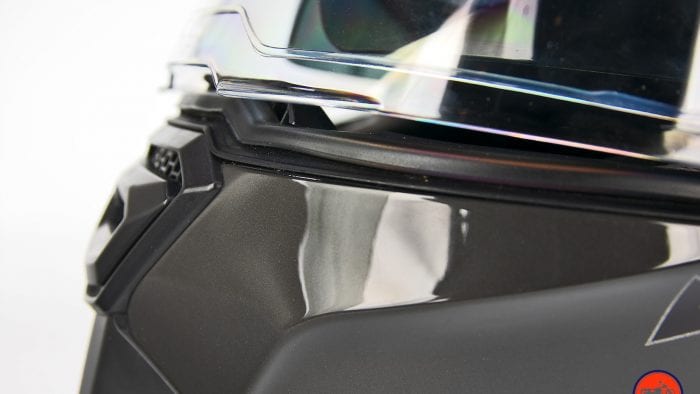 The visor just barely open on the Touratech Aventuro Traveller Carbon.