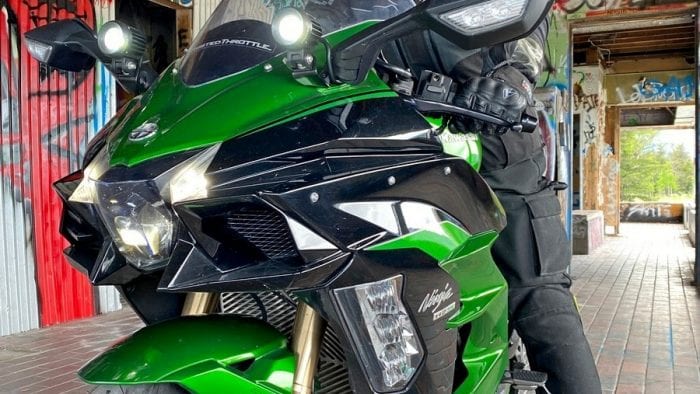The Klim Krios Pro being worn by a rider on a Kawasaki Ninja H2SX SE.