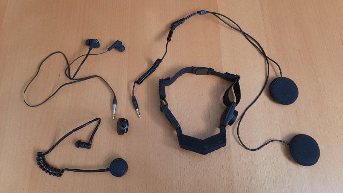 iASUS Stealth Throat microphone laid out on table