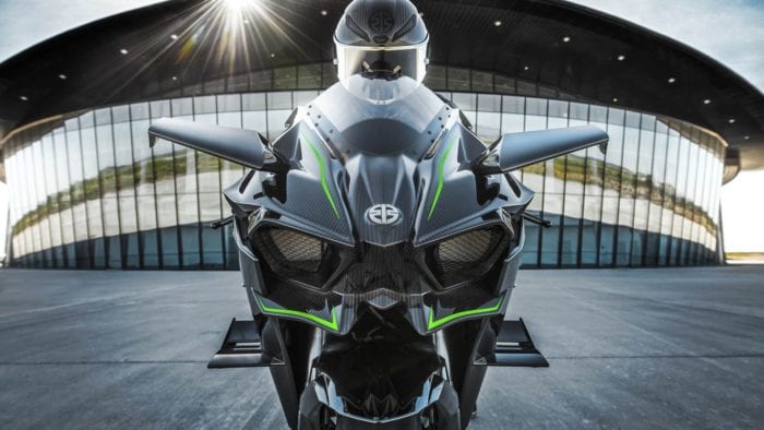 A Kawasaki H2 with a helmet sitting on top