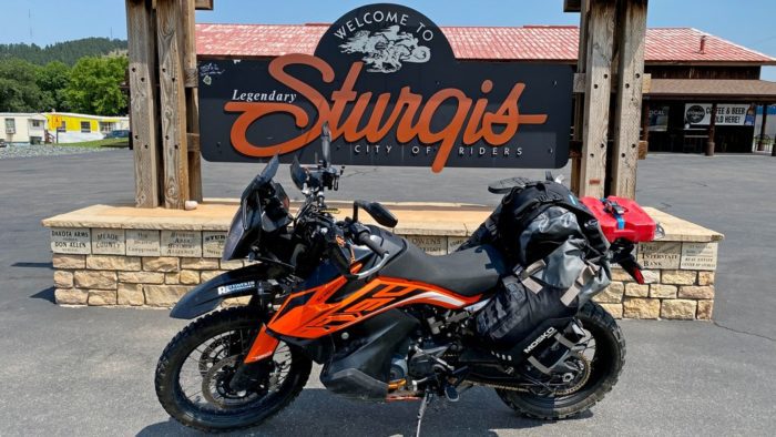 My KTM 790 Adventure in front of the welcome sign in Sturgis, SD.
