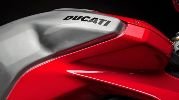 A picture of a gas tank of a Ducati bike.