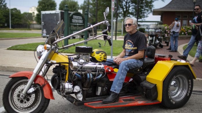an anttendee of the Rebel Road Bike Rally shows off his sweet ride