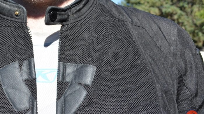 Top collarbone area of the Arc Air Mesh jacket, with focus on neck straps and shoulder material