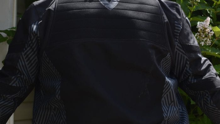 A back view of the Arc Air Mesh jacket, with focus on the visibility points and safety rating