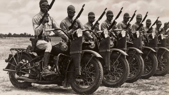 view of a line of military soldiers posing for a photo