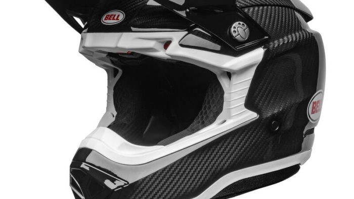 A front-right view of the Bell Moto-10 Full-Face helmet, in the new gloss carbon finish