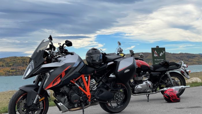 2016 KTM Superduke GT parked next to 2015 Triumph Bonneville T100