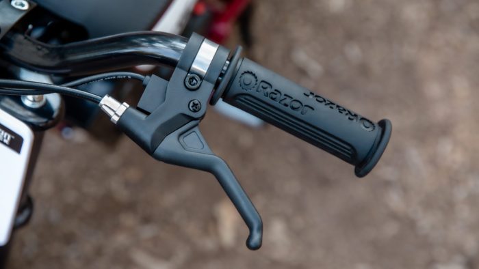 A close-up of the throttle on the new sFTR Mini motorcycle from Indian Motorcycles - an electric-youth bike available to the smaller riding community