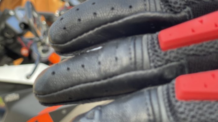 Close-up of perforations in leather fingers on REV'IT Sand 4 Gloves