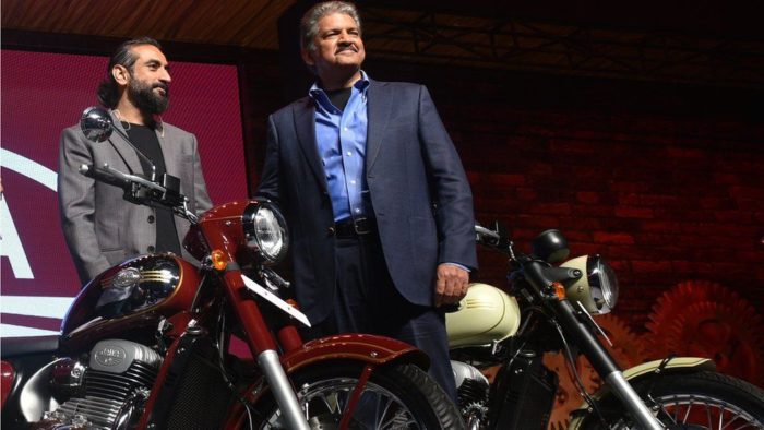 A view of Anand Mahindra - CEO of Mahindra Group - and stakeholder for 60% of BSA Motorcycles, next to a series of JAWA Motorbikes