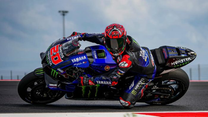 A view of Fabio Quatararo riding his bike at a MotoGP event