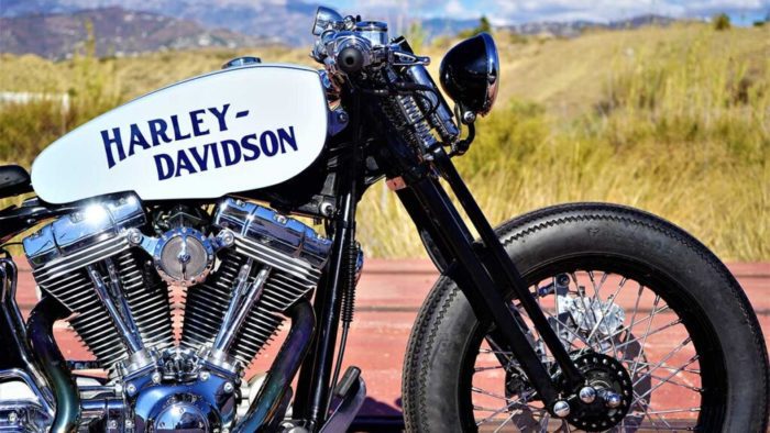 the front-side view from the custom "Springer Bobber Blue" Harley-Davidson Softail Standard Motorcycle from Lord Drake Kustoms