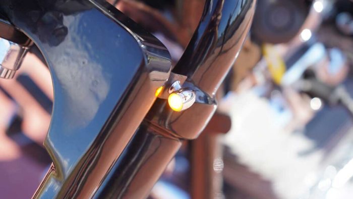 the turn signals from the custom "Springer Bobber Blue" Harley-Davidson Softail Standard Motorcycle from Lord Drake Kustoms