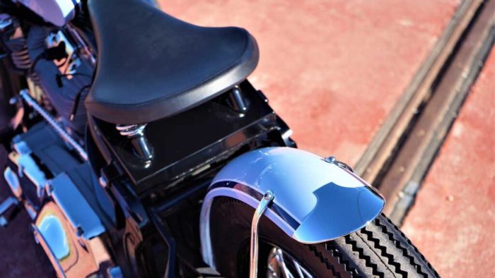 the seat view from the custom "Springer Bobber Blue" Harley-Davidson Softail Standard Motorcycle from Lord Drake Kustoms