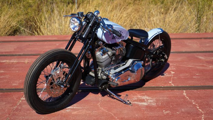 A side view from the custom "Springer Bobber Blue" Harley-Davidson Softail Standard Motorcycle from Lord Drake Kustoms