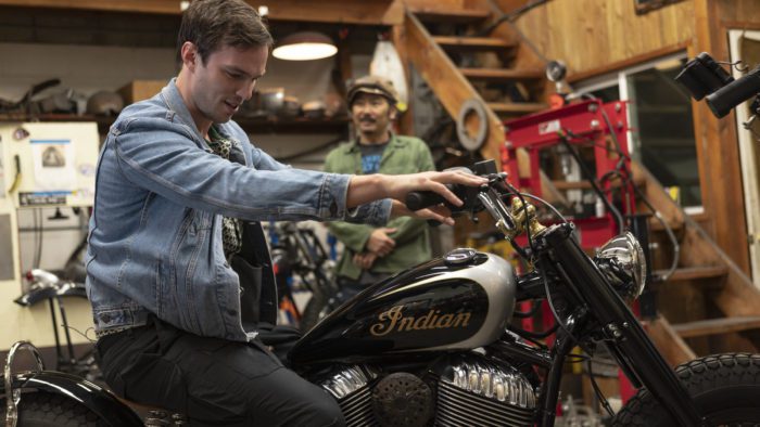 Gō Takamine with Nicolas Hoult next to the new Brat Style bobber from Inaidn Motorcycles that Takamine modded out for the movie star