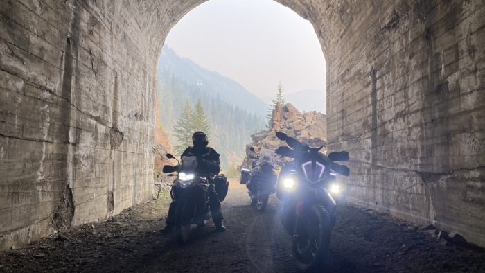 Denali Cansmart Controller on KTM motorcycle in forest