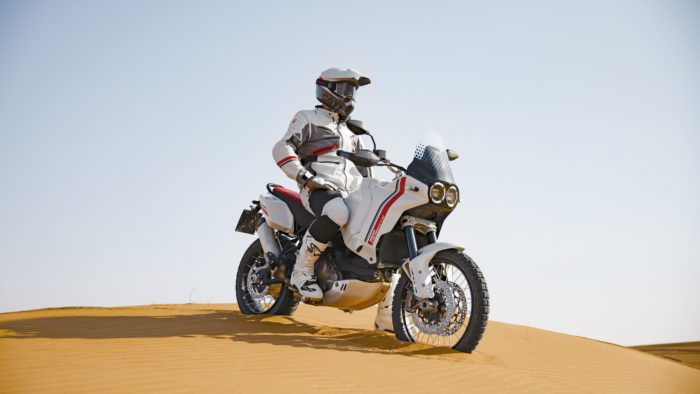 A view of the Ducati DesertX being ridden in the desert