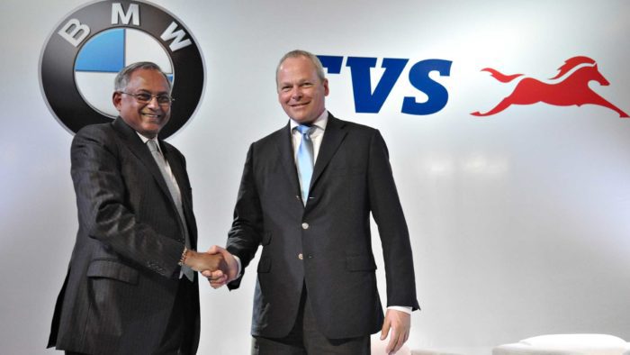 A view of the BMW and TVS logos together, in symbolism of the upcoming partnership between the two companies