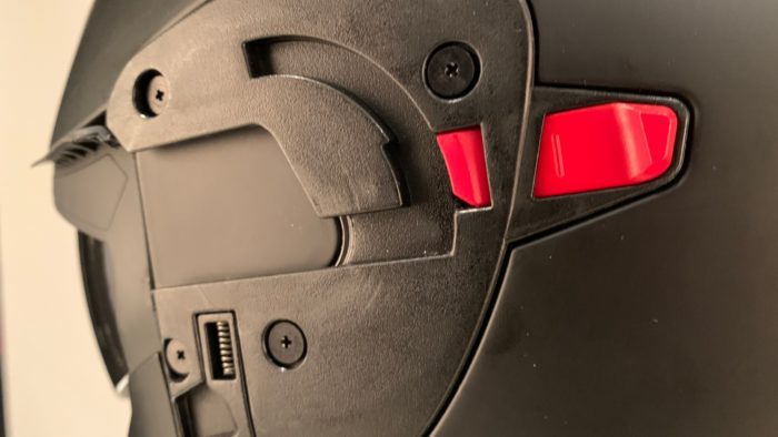 Closeup of visor lock on EXO GT930 helmet
