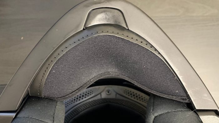 Chin padding on the inside of the helmet