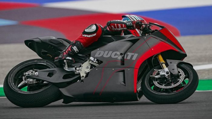 A side view of the Ducati electric prototype on the track