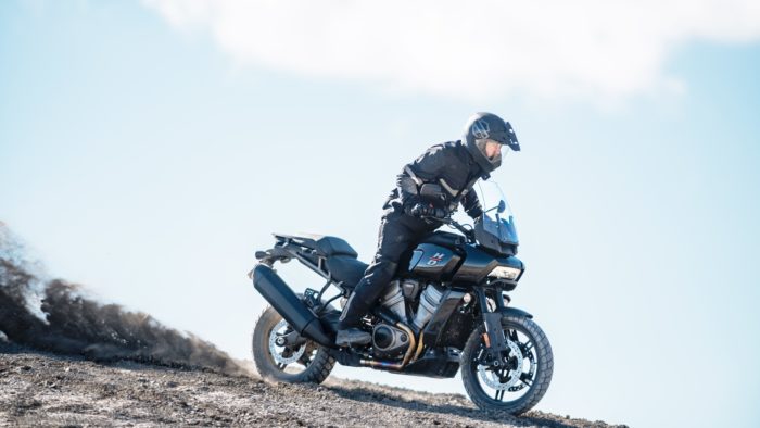 Image of a rider on a Pan America riding down an incline