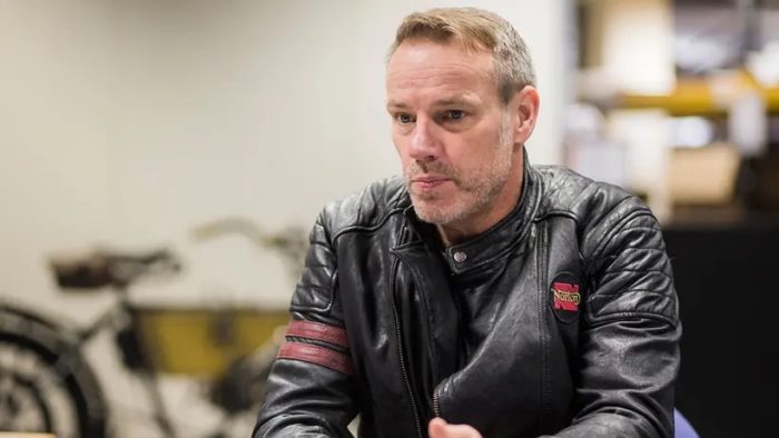 A view of Stuart Garner with his machines that he created with Norton Motorcycles