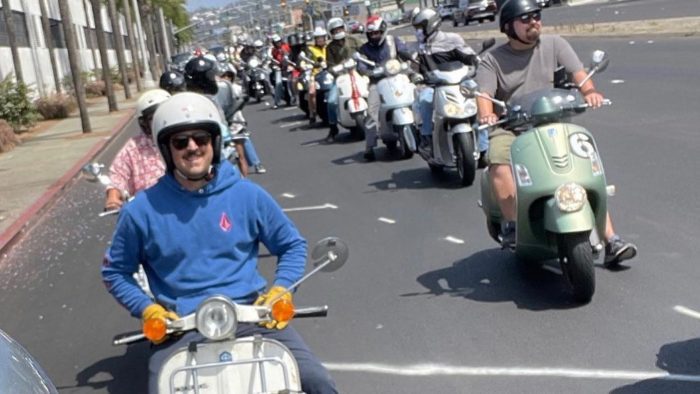 Riders on their Vespas at an Amerivespa event